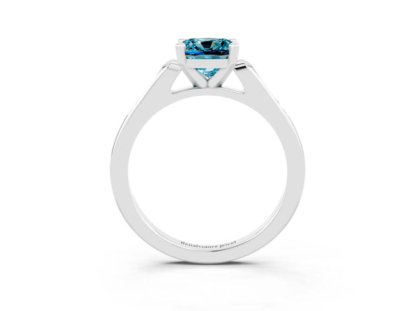Silver Cushion Cut Blue Topaz Solitaire Ring with Channel Set Round  Band and Prong Setting
