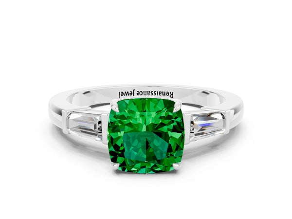 Platinum Cushion Cut Emerald Three-Stone Ring with Tapered Baguette Side Stones and Prong Setting