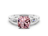 White gold Cushion Cut Cut Diamond Ring with Tapered Baguette Side Stones in Four-Prong Setting