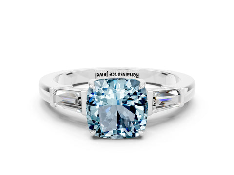 White gold Cushion Cut Cut Diamond Ring with Tapered Baguette Side Stones in Four-Prong Setting