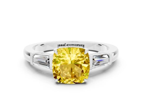 White gold Cushion Cut Cut Diamond Ring with Tapered Baguette Side Stones in Four-Prong Setting