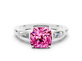 White gold Cushion Cut Cut Diamond Ring with Tapered Baguette Side Stones in Four-Prong Setting