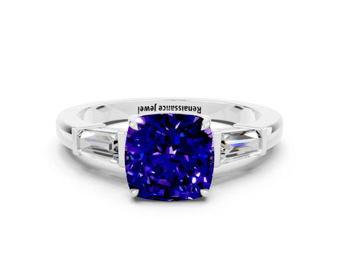 White gold Cushion Cut Cut Diamond Ring with Tapered Baguette Side Stones in Four-Prong Setting