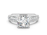 White gold Cushion Cut Cut Pave Diamond Engagement Ring with Channel Set Band and Four-Prong Setting