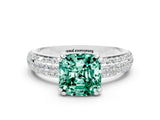 White gold Cushion Cut Cut Pave Diamond Engagement Ring with Channel Set Band and Four-Prong Setting