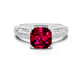 White gold Cushion Cut Cut Pave Diamond Engagement Ring with Channel Set Band and Four-Prong Setting