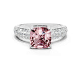 White gold Cushion Cut Cut Pave Diamond Engagement Ring with Channel Set Band and Four-Prong Setting