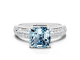 White gold Cushion Cut Cut Pave Diamond Engagement Ring with Channel Set Band and Four-Prong Setting