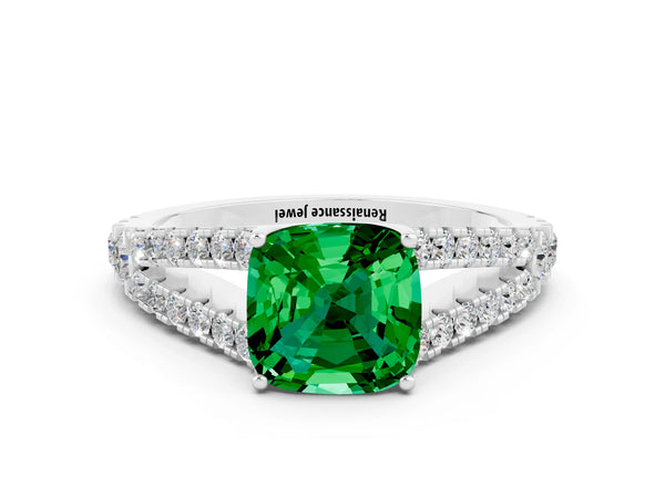 Silver Cushion Cut Emerald Split Shank Engagement Ring with Round Pavé and Prong Setting