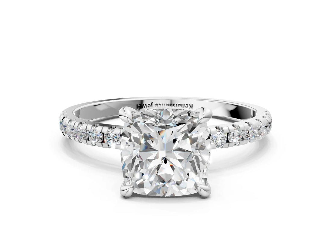White gold Cushion Cut Diamond Brilliant Solitaire Ring with Pavé Band and Four-Prong Setting