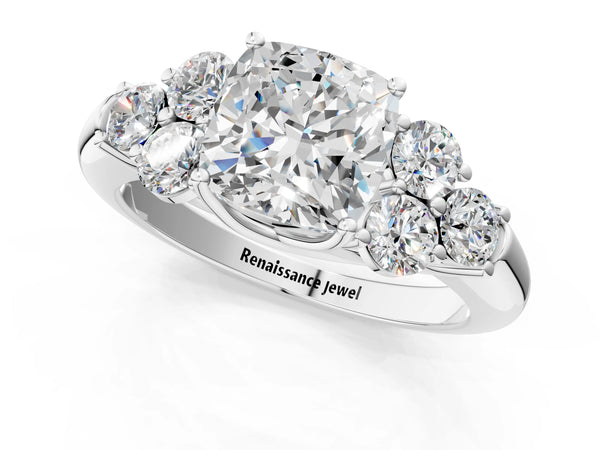 Platinum Cushion Cut Diamond Cluster Ring with Round Accent Stones and Prong Setting on a Classic Band