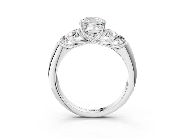 Platinum Cushion Cut Diamond Cluster Ring with Round Accent Stones and Prong Setting on a Classic Band