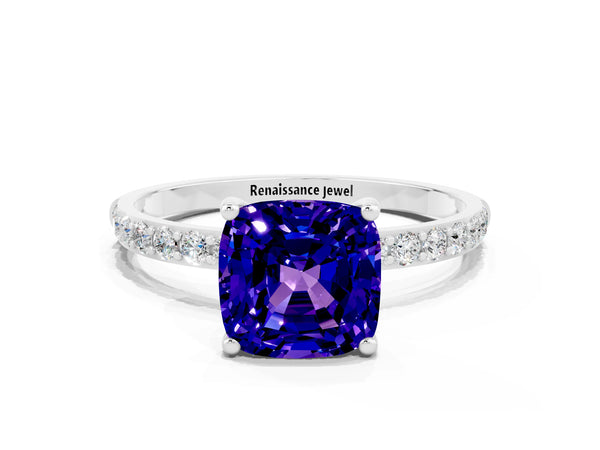 Silver Cushion Cut Tanzanite Solitaire Ring with Round Pavé Shoulders and Prong Setting
