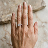14K White Gold 1.52 Carat D VVS2 Cushion Cut Diamond Ring with Baguette Side Stones, Channel Set Band, and Four-Prong Setting