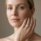 14K White Gold 1.52 Carat D VVS2 Cushion Cut Diamond Ring with Baguette Side Stones, Channel Set Band, and Four-Prong Setting