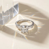 14K White Gold 1.52 Carat D VVS2 Cushion Cut Diamond Ring with Baguette Side Stones, Channel Set Band, and Four-Prong Setting