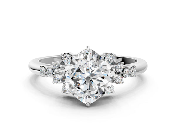 Platinum Cushion Cut Diamond Ring with Side Stones and Four-Prong Setting