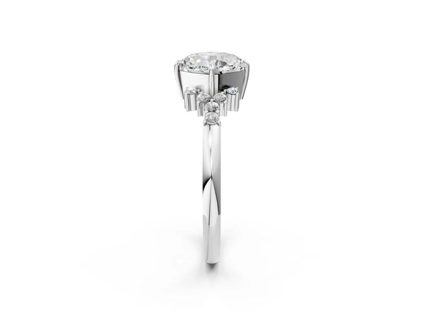 Platinum Cushion Cut Diamond Ring with Side Stones and Four-Prong Setting