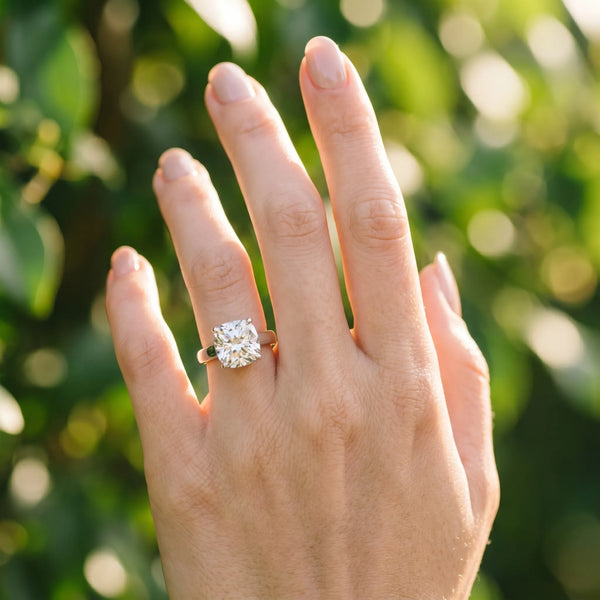White gold Cushion Cut Diamond Solitaire Engagement Ring with Four-Prong Setting and Plain Band