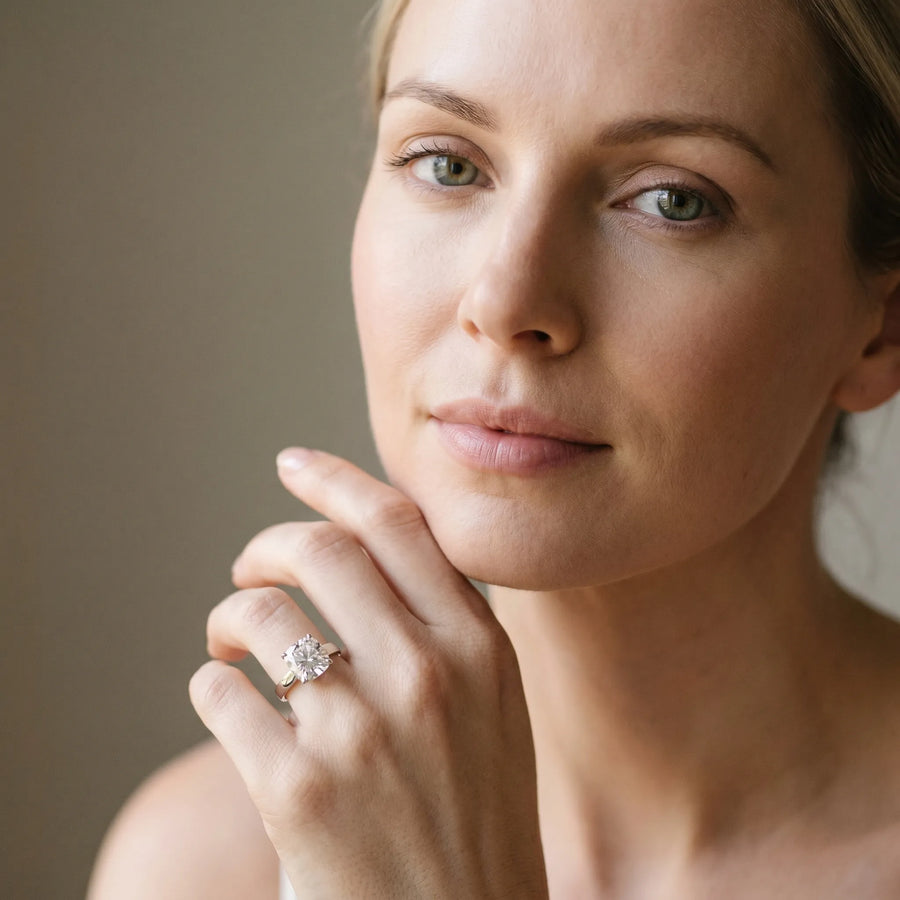 White gold Cushion Cut Diamond Solitaire Engagement Ring with Four-Prong Setting and Plain Band