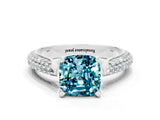 White gold Cushion Cut Diamond Solitaire Engagement Ring with Pavé Band and Four-Prong Setting