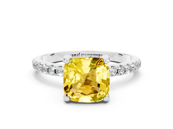 Platinum Cushion Cut Yellow Sapphire Hidden Halo Engagement Ring with Round Pavé Band and Prong Setting