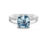 White gold Cushion Cut Diamond Solitaire Ring with Four-Prong Setting and Pavé Band