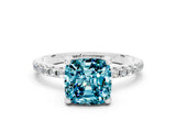 White gold Cushion Cut Diamond Solitaire Ring with Four-Prong Setting and Pavé Band