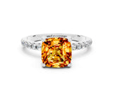 White gold Cushion Cut Diamond Solitaire Ring with Four-Prong Setting and Pavé Band