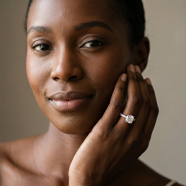 White gold Cushion Cut Diamond Solitaire Ring with Pavé Accents and Four-Prong Setting