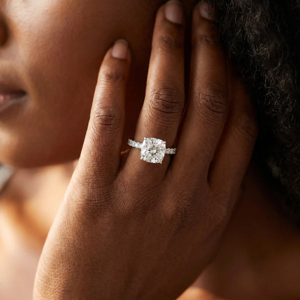 White gold Cushion Cut Diamond Solitaire Ring with Pavé Accents and Four-Prong Setting