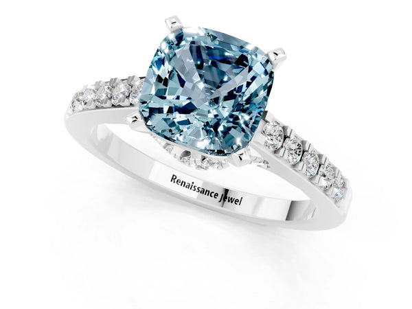 Platinum Cushion Cut Aquamarine Solitaire Ring with Crossover Gallery and Round  Pavé Band