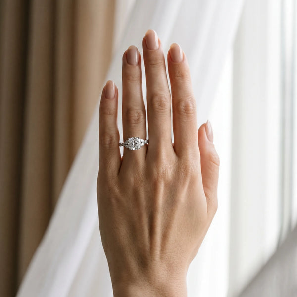 White gold Cushion Cut Diamond Solitaire Ring with Side Stones and Four-Prong Setting