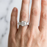 White gold Cushion Cut Diamond Three-Stone Ring with Channel Set Band and Four-Prong Setting_81