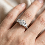 White gold Cushion Cut Diamond Three-Stone Ring with Channel Set Band and Four-Prong Setting_85