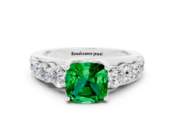Platinum Cushion Cut Emerald Engagement Ring with Pavé Band and Four-Prong Setting