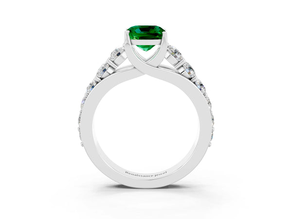 Platinum Cushion Cut Emerald Engagement Ring with Pavé Band and Four-Prong Setting
