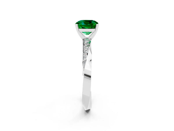 Platinum Cushion Cut Emerald Engagement Ring with Side Stone Accents and Four-Prong Setting