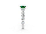 White gold Cushion Cut Emerald Prong Setting with Side Stones on a Pave Band_2