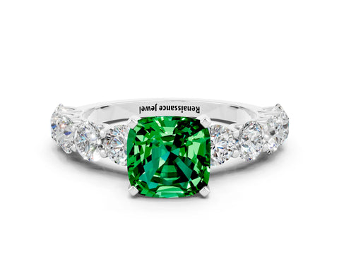 White gold Cushion Cut Emerald Prong Setting with Side Stones on a Pave Band