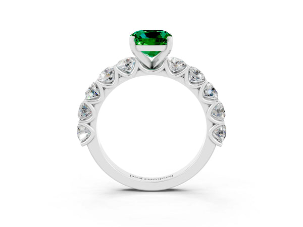 White gold Cushion Cut Emerald Prong Setting with Side Stones on a Pave Band