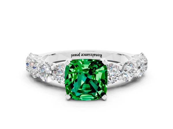 White gold Cushion Cut Emerald Prong Setting with Side Stones on a Pave Band