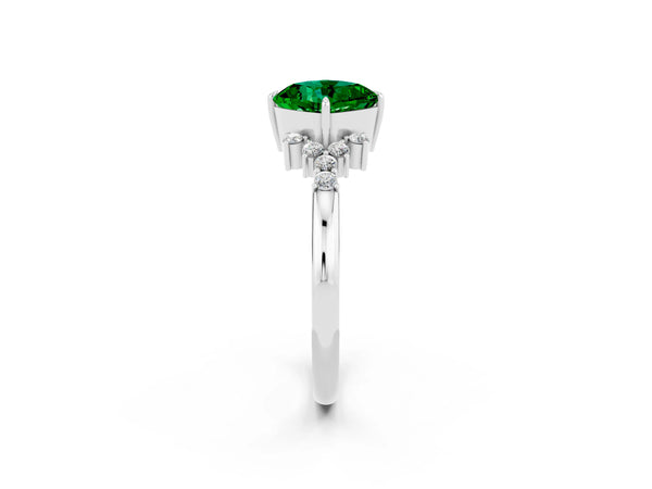 Platinum Cushion Cut Emerald Ring with Side Stones and Four-Prong Setting