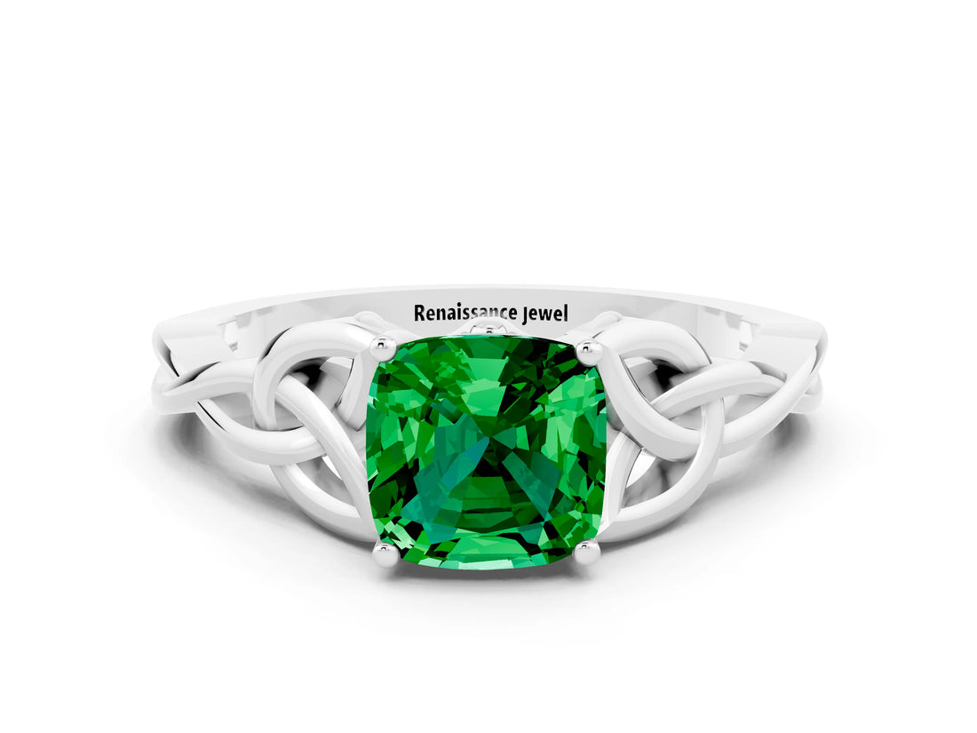 White gold Cushion Cut Emerald Solitaire Engagement Ring with Celtic Knot Band and Four-Prong Setting