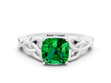 White gold Cushion Cut Emerald Solitaire Engagement Ring with Celtic Knot Band and Four-Prong Setting