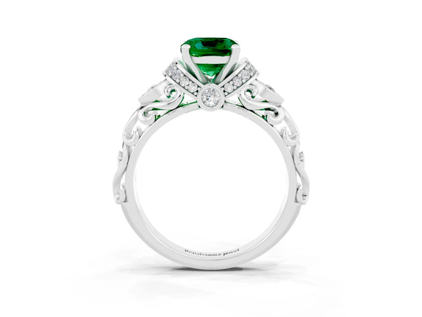 Platinum Cushion Cut Emerald Solitaire Ring with Filigree Band and Four-Prong Setting
