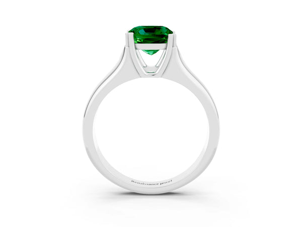 Platinum Cushion Cut Emerald Solitaire Ring with Wide Band and Prong Setting