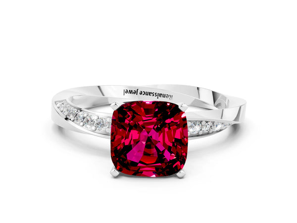 Platinum Cushion Cut Garnet Engagement Ring with Side Stone Accents and Four-Prong Setting