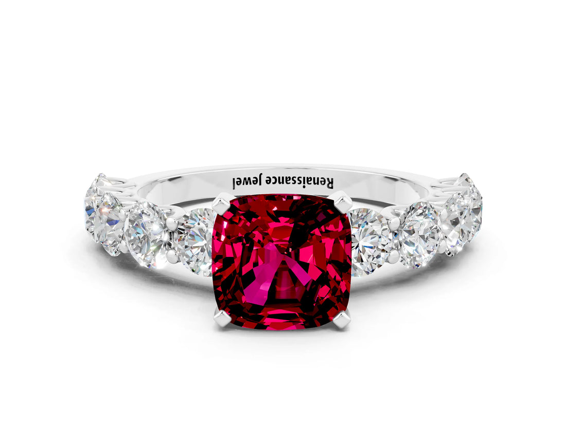 White gold Cushion Cut Garnet Prong Setting with Side Stones on a Pave Band