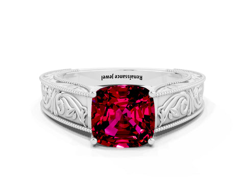 White gold Cushion Cut Garnet Solitaire Ring with Engraved Band and Four-Prong Setting